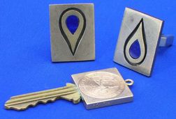 Pair of Contemporary 14kt and 18kt Cuff Links and 14kt Gold St. Christopher Key Cove. 